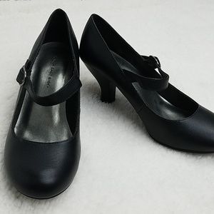 Strapped black heels